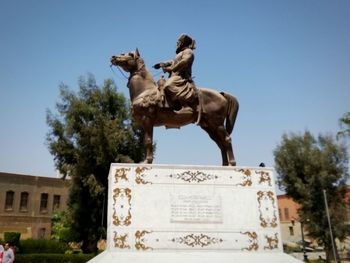 Low angle view of statue against clear sky