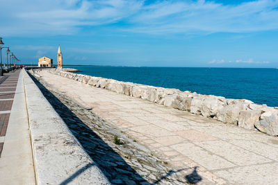 Caorle. promenade and beach. early summer colors