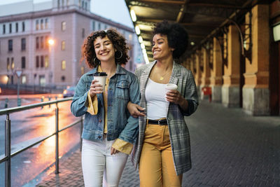 Young couple smiling in city