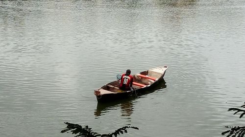 High angle view of people in boat on lake