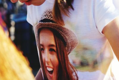 Close-up of woman wearing hat