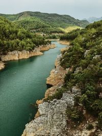 High angle view of river amidst rocks