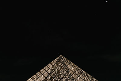 Low angle view of historical building against sky at night