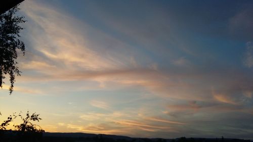 Scenic view of landscape at sunset