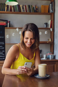 Young woman using mobile phone