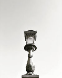 Low angle view of street light against clear sky