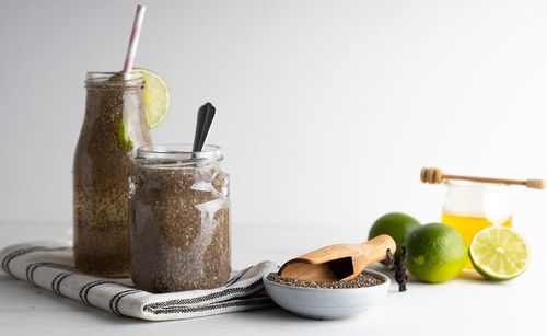 Close-up of drink in glass jar on table