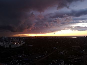 High angle view of buildings against sky during sunset