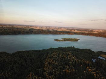 High angle view of bay against sky during sunset