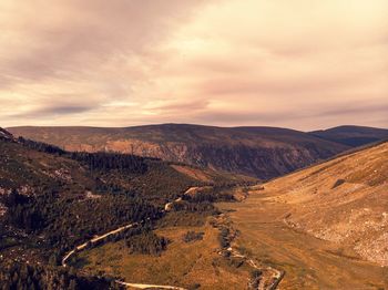 Aerial view of landscape against sky during sunset