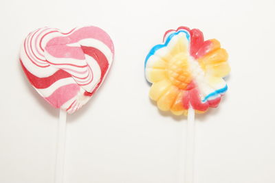 Close-up of cake against white background