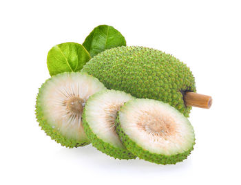 Close-up of fruits against white background