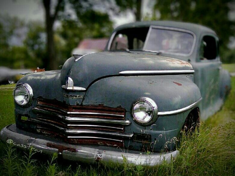 transportation, land vehicle, car, mode of transport, vintage car, retro styled, old-fashioned, headlight, old, stationary, travel, abandoned, close-up, field, obsolete, vehicle, grass, focus on foreground, day, part of