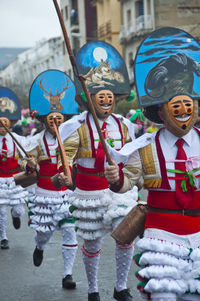 Full length of children in traditional clothing