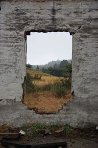 View of old ruin on field