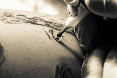 Close-up of young woman looking down