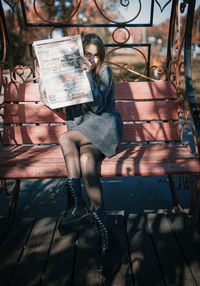Woman sitting on bench