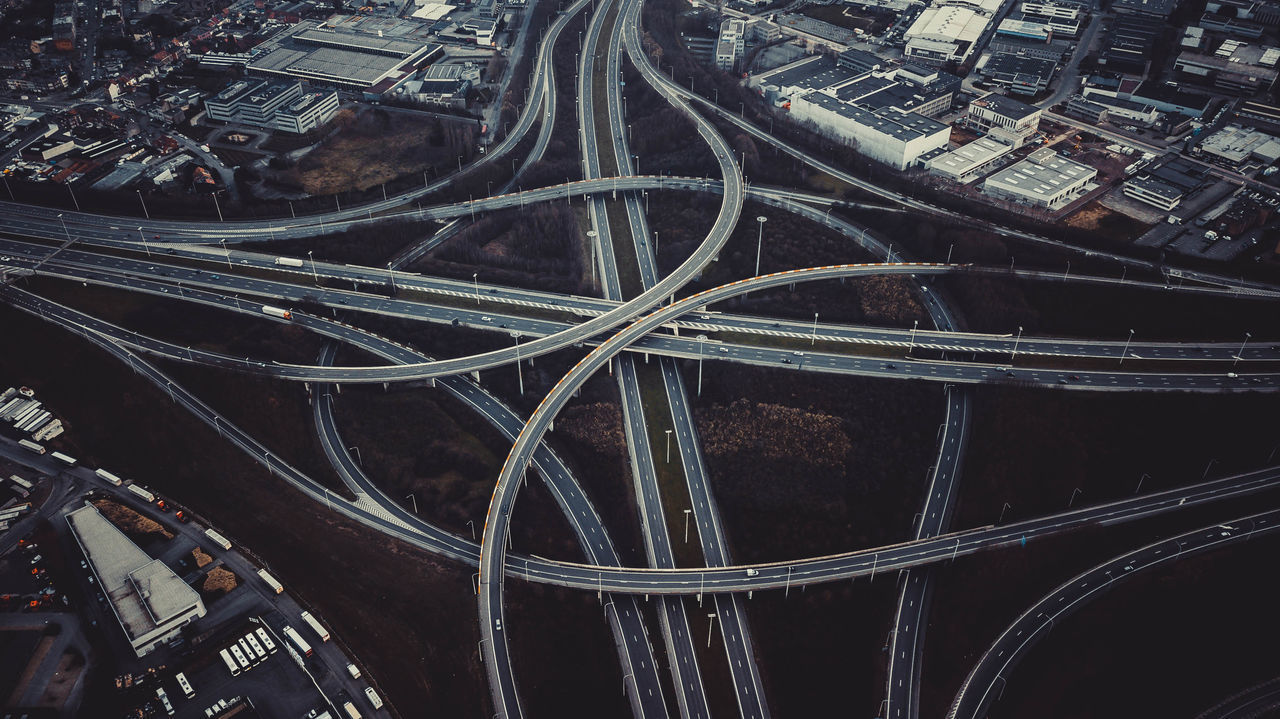 HIGH ANGLE VIEW OF CARS ON ROAD