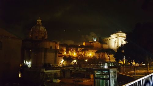 Illuminated cathedral against sky at night