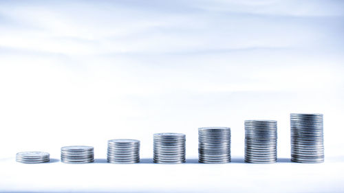 Close-up of stack of objects against white background