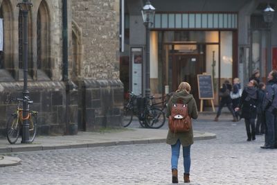 Woman standing in city