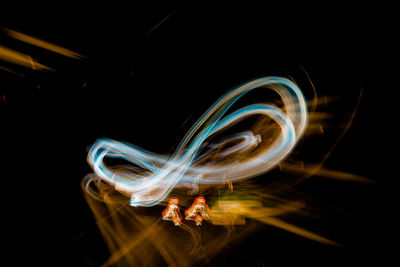 Light painting against black background