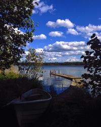 Boats moored in river