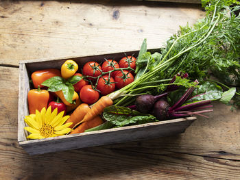 Fruits and vegetables on wooden table