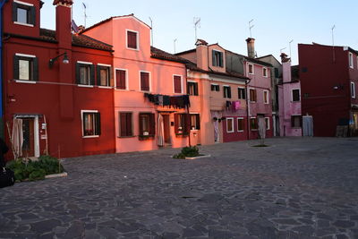 View of residential buildings against sky