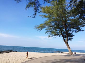 Scenic view of sea against blue sky