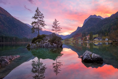 Scenic view of lake against sky during sunset