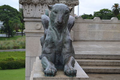 Close-up of horse statue against sky