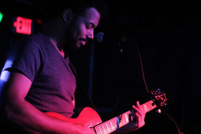 Young man playing guitar