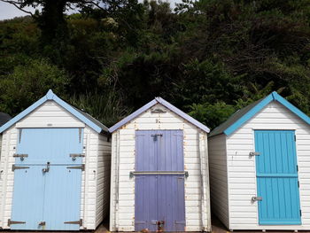 A row of colourful beach huts in paignton, devon.