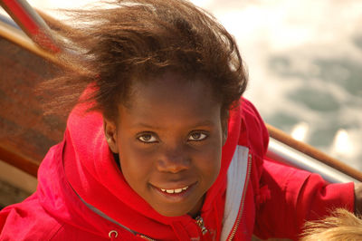 Close-up portrait of smiling girl