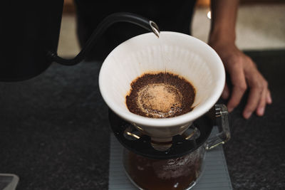 Close-up of coffee cup on table