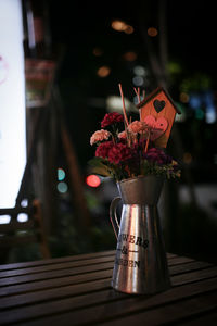 Close-up of flower vase on table