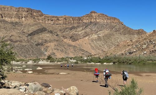 Group of people on rocky mountain