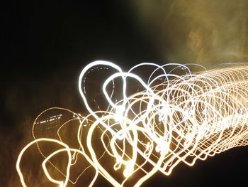 Light painting against clear sky at night