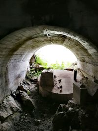 Arch bridge over old building