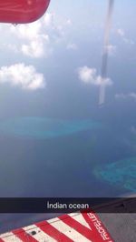 Information sign against sky