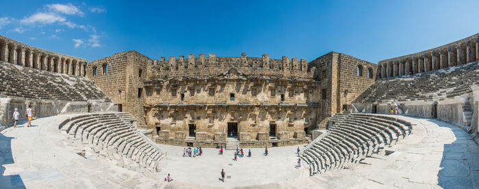 Group of people in front of historical building