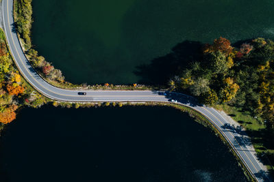 High angle view of road by trees in city