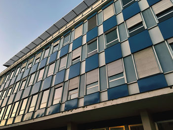 Low angle view of modern building against clear sky