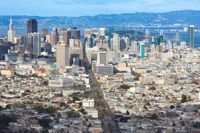 Aerial view of cityscape against sky