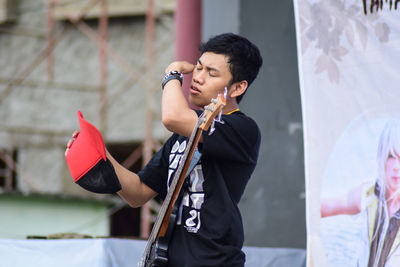 Boy standing on stage