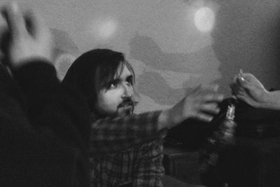 Portrait of young couple looking at camera