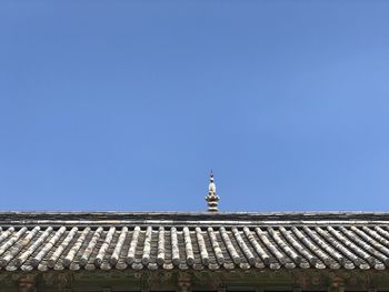 Low angle view of building against blue sky
