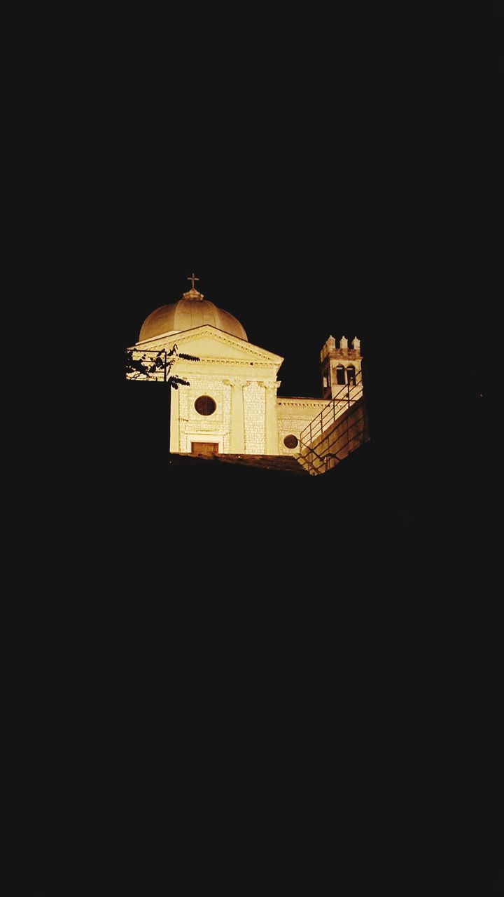 building exterior, architecture, built structure, religion, place of worship, spirituality, church, clear sky, copy space, night, low angle view, cathedral, tower, history, illuminated, cross, clock tower, famous place