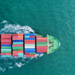 Aerial view of container ship on sea